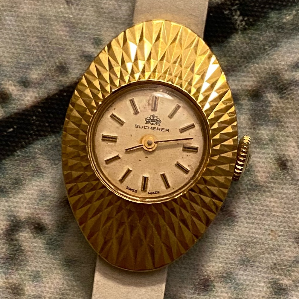 Vintage Bucherer interchangeable face and straps watch.